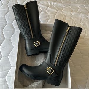 Steve Madden rubber boots.